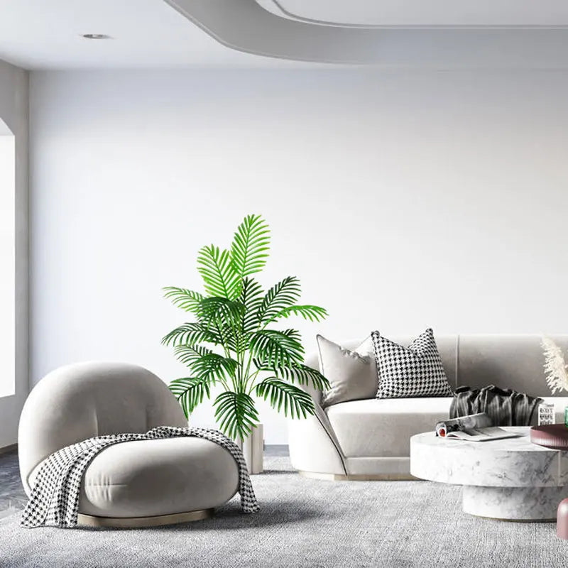 Groene kunstboom als woondecoratie. Deze tropische nep plant brengt een exotische sfeer in elke ruimte binnen.