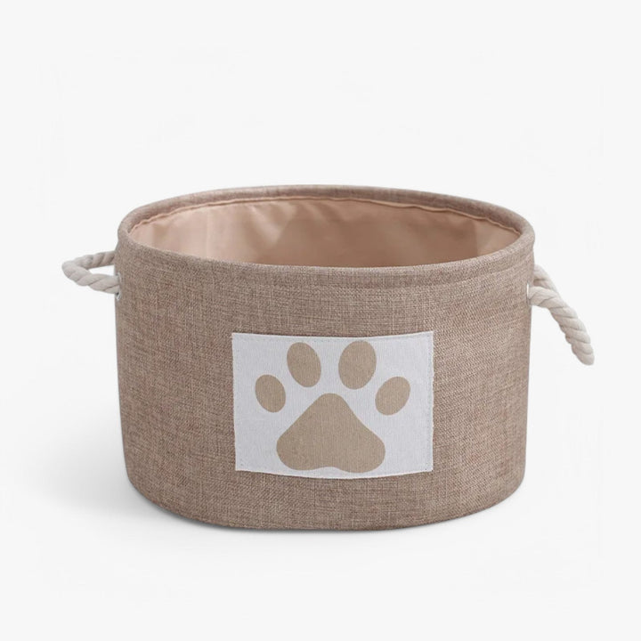 Opgevouwen speelgoedmand Livia voor honden. Compact, opvouwbaar design met touw handgreep, ideaal voor ruimtebesparing.