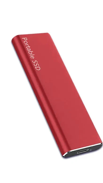 Ultradunne 4TB USB-C externe harde schijf, getoond naast een laptop. Snelle, draagbare opslag van al je computergegevens.