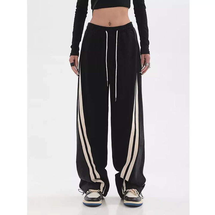 Groene sportieve dames joggingbroek, activewear met hoge taille voor ultiem comfort en stijl.