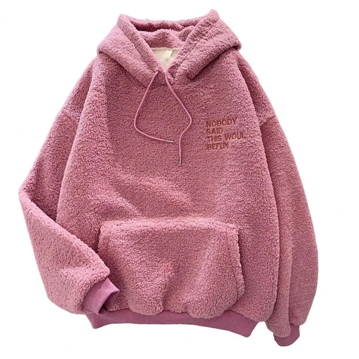 Warme dames winter hoodie, perfect voor koude dagen. Deze comfortabele loose fit trui houdt je behaaglijk en modieus.