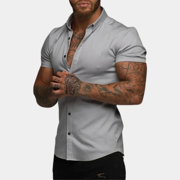 Hoogwaardig Hoymans heren overhemd, stijlvol effen ontwerp. Combineert comfort met een zakelijke of vrije tijd look.