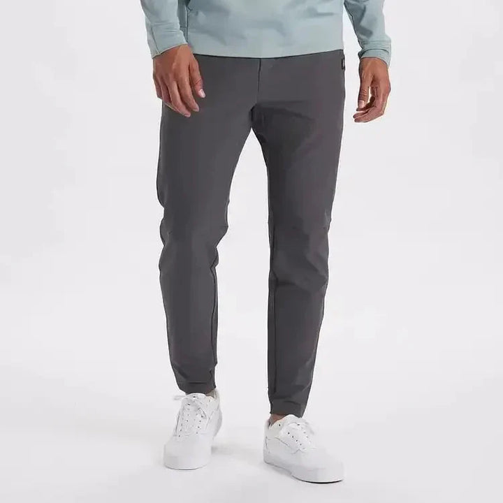 Donkergroene slim-fit Ashton herenbroek met rechte pijpen, comfortabel en modern voor een tijdloze look.