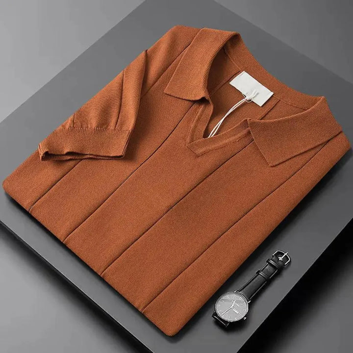 Verfijnde heren polo met korte mouwen, slim fit en unieke ribbels structuur, basic maar chic.