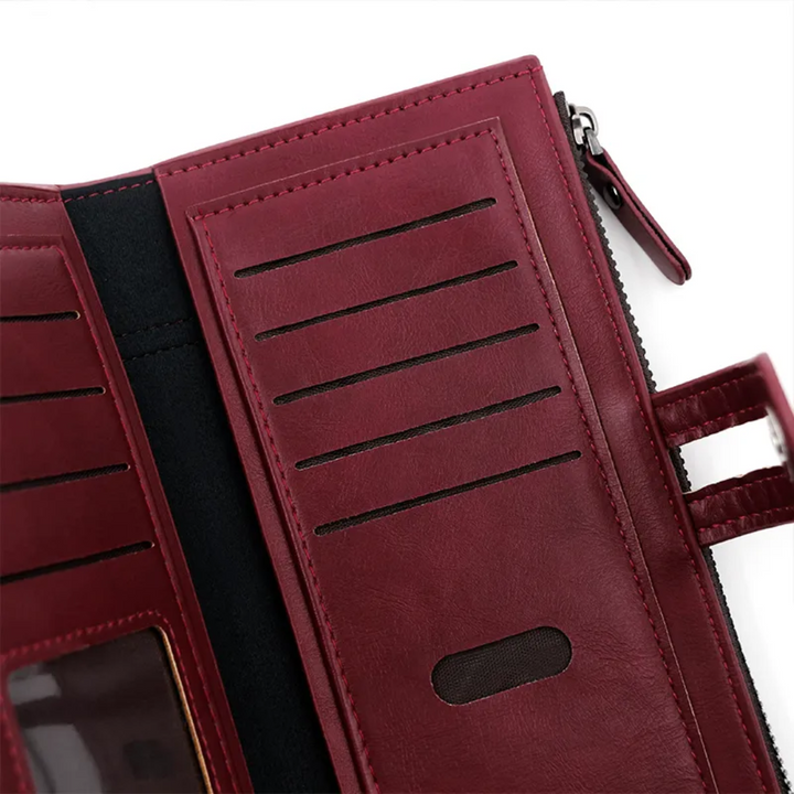 Elegante lange leren portemonnee, unisex, netjes gesloten met duurzame rits.