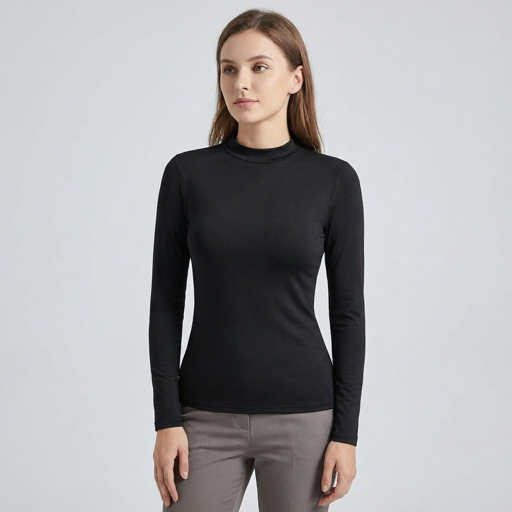 Zwart slim fit thermoshirt voor dames, ideaal als warme basislaag. Comfortabele sport- en winterkleding voor buiten.