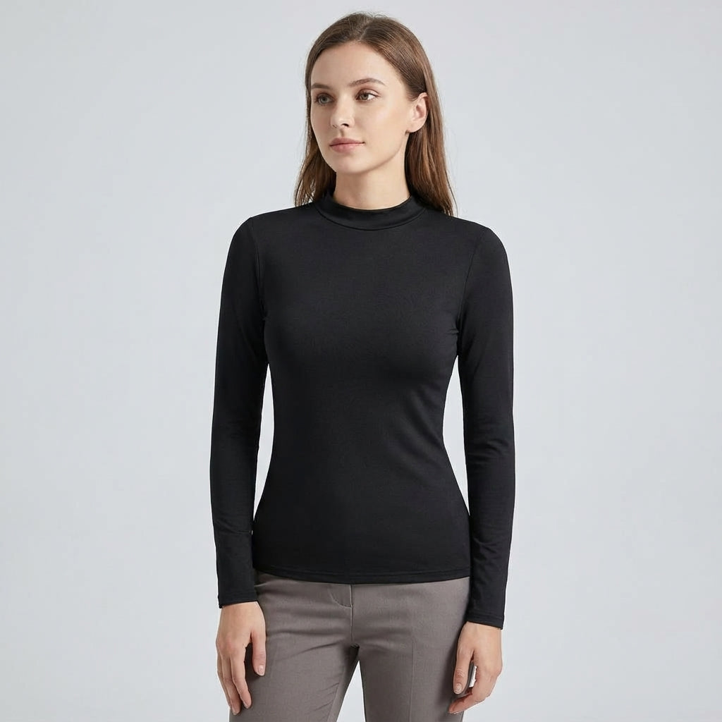 Zwart slim fit thermoshirt voor dames, ideaal als warme basislaag. Comfortabele sport- en winterkleding voor buiten.