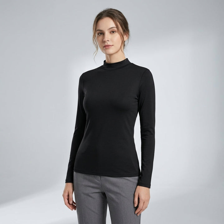 Comfortabel dames slim fit thermoshirt, perfect voor outdoor en winter. Warme basislaag met lange mouwen en ronde hals.