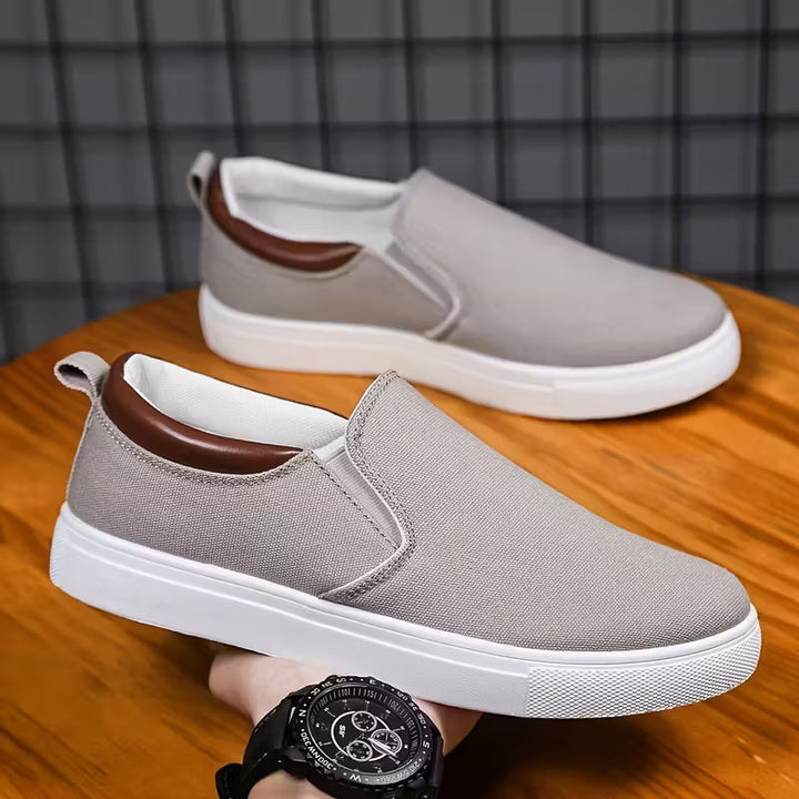 Duurzame heren instappers: ademende canvas slip-on schoenen met elastische pasvorm, geschikt voor alledaags gebruik.