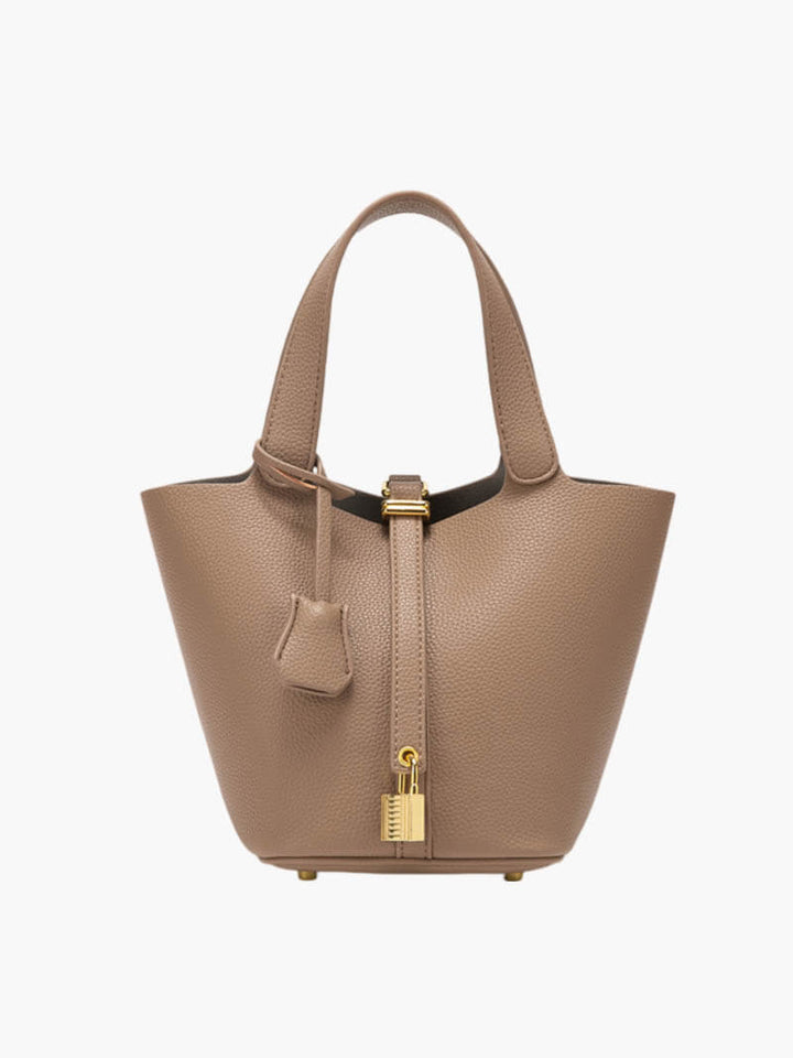 Lederen handtas voor vrouwen met korte hengsels, een chique en duurzaam accessoire voor elke dag.