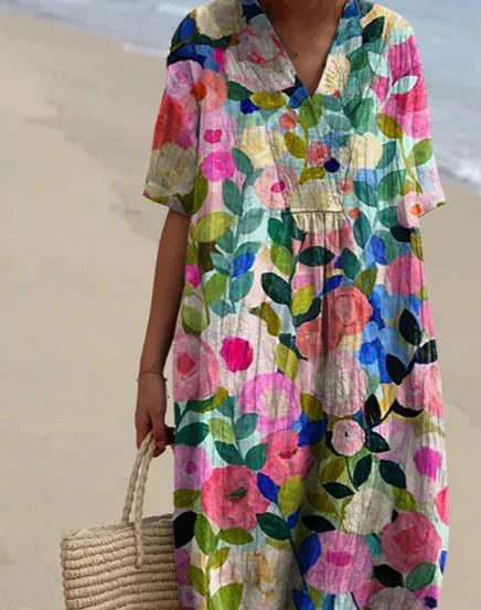 Kleurrijke dames lentejurk met bloemenprint, comfortabel en casual voor de zomer. Populair mode-item.