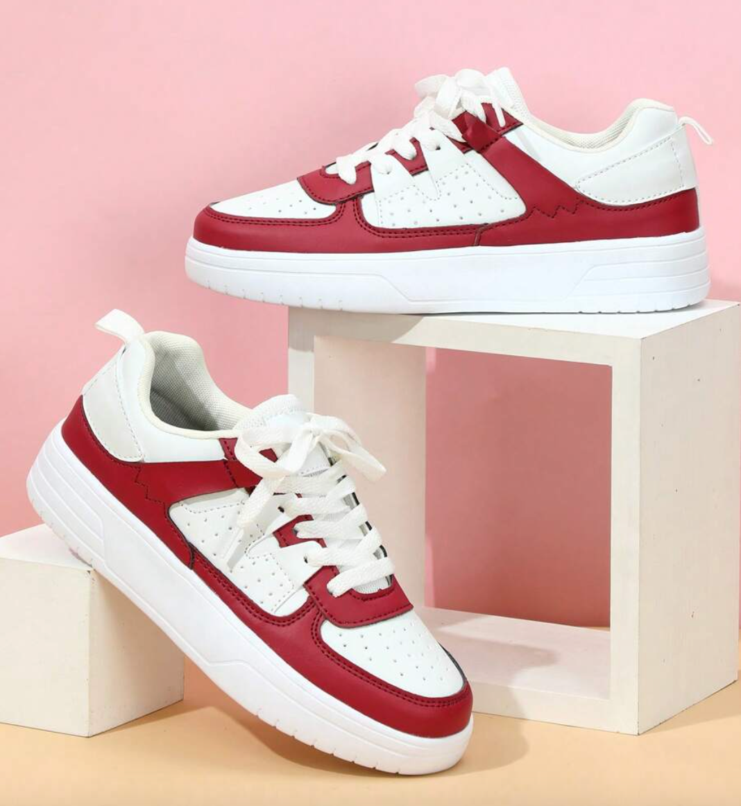 Kleurrijke Isabelle dames sneakers met opvallende regenboogprint, een echte eyecatcher.