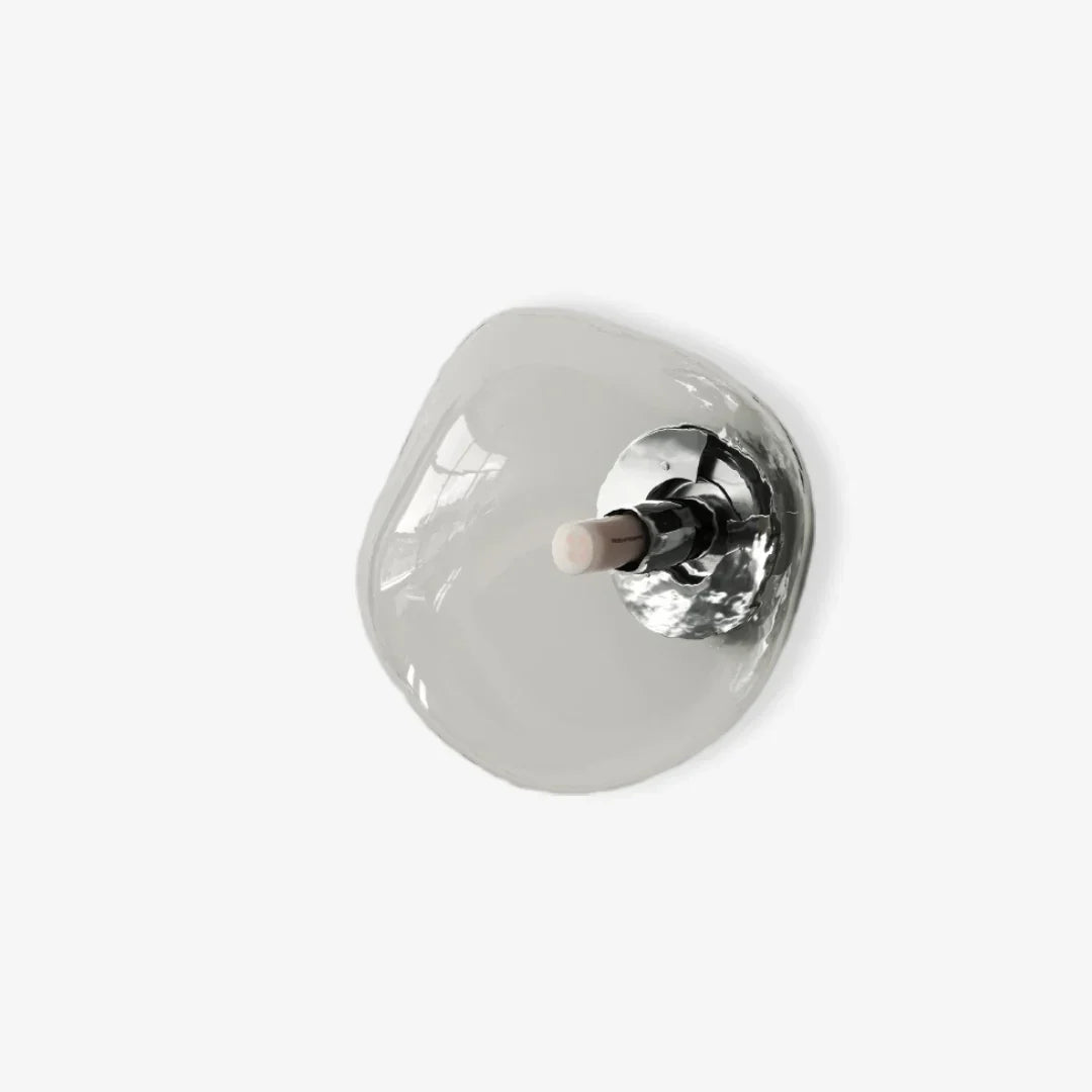 Hotelverlichting: chique glazen wandlamp die luxe uitstraalt.