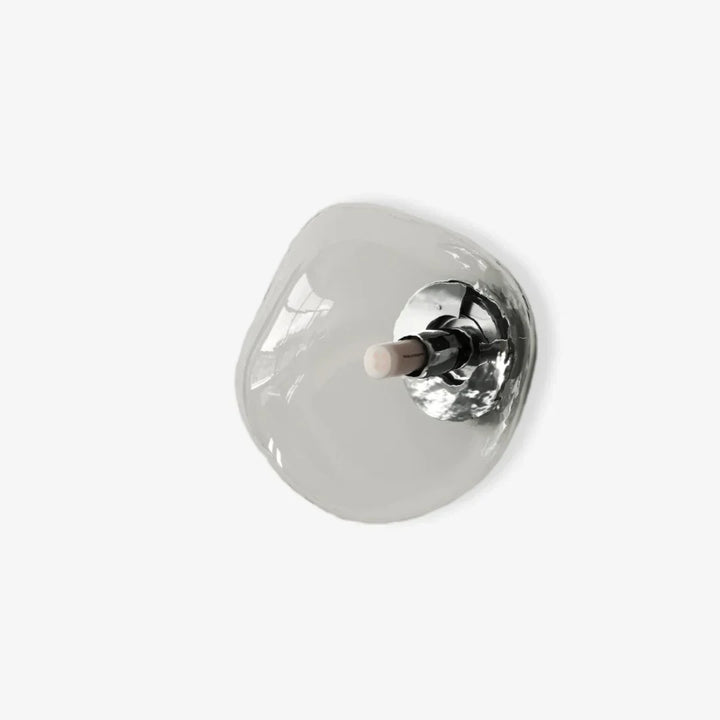Hotelverlichting: chique glazen wandlamp die luxe uitstraalt.