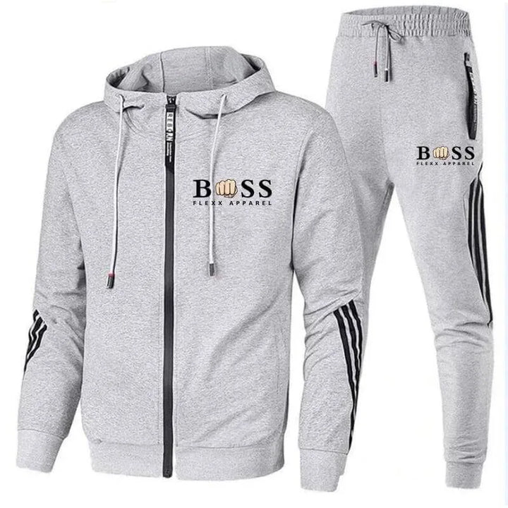 Heren trainingspak compleet: hoodie met capuchon en bijpassende joggingbroek met elastische tailleband.