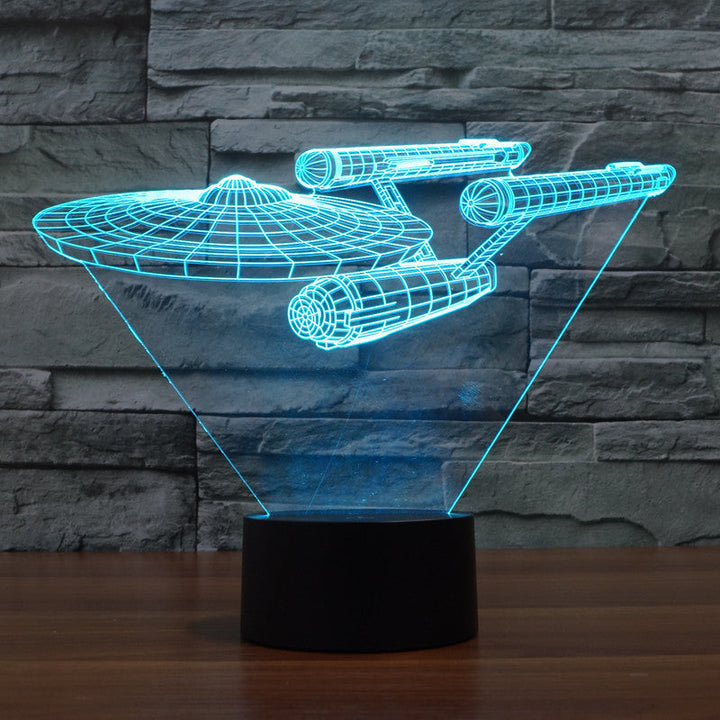 Multicolor LED nachtlamp in de vorm van een 3D ruimteschip, creëert sfeervolle verlichting in elke kamer.