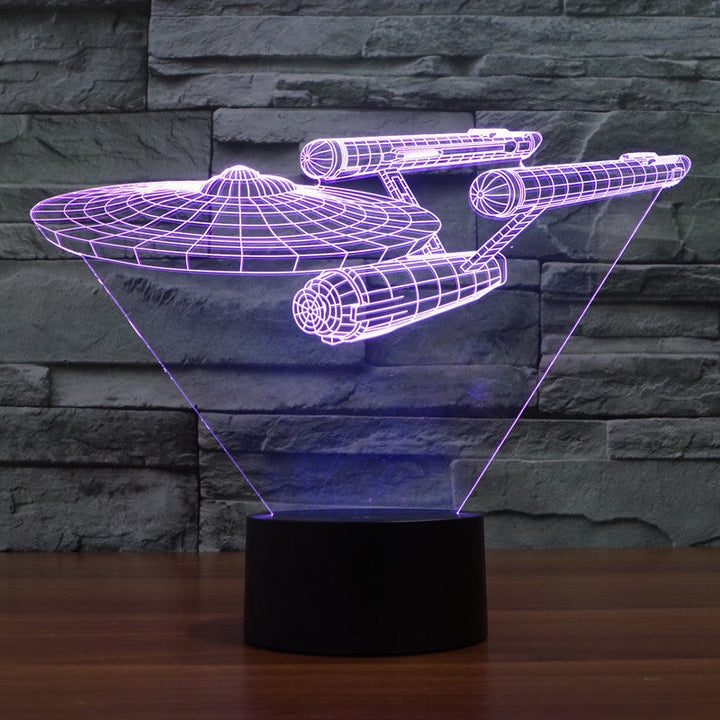 Futuristische zwevende LED illusielamp ruimteschip, unieke 3D lamp met wisselende kleuren voor sci-fi fans.