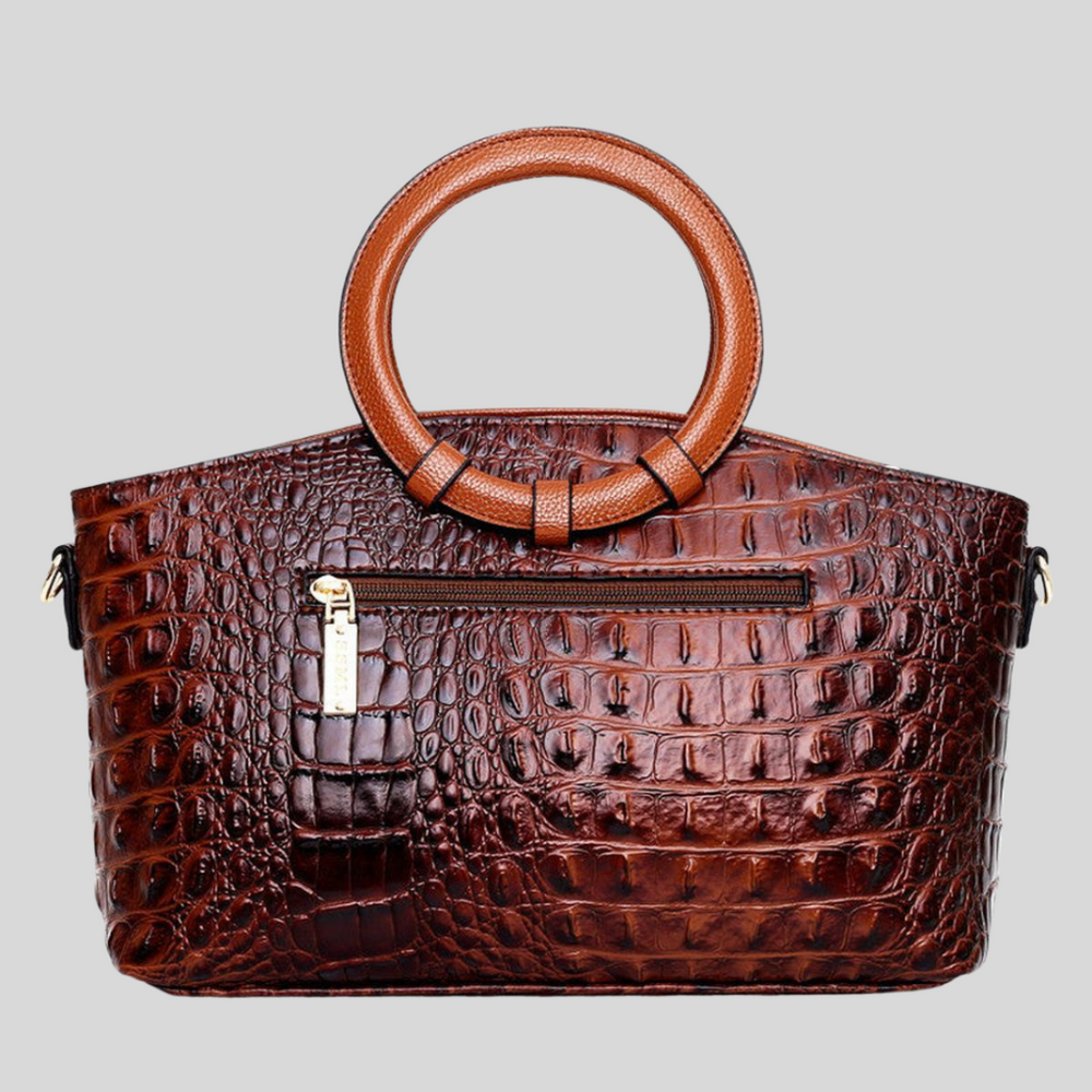 Veelzijdige Leah dames handtas, gestructureerd met schouder- en crossbody optie. Beschikbaar in bruin en zwart.