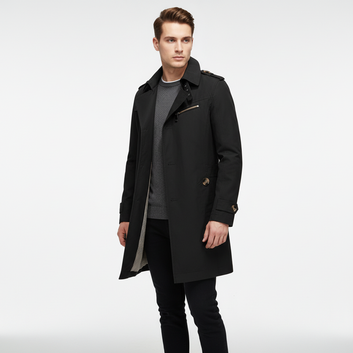 Herfst/winter heren trenchcoat. Gestructureerde lange jas met schoudervullingen voor een warme, klassieke look.