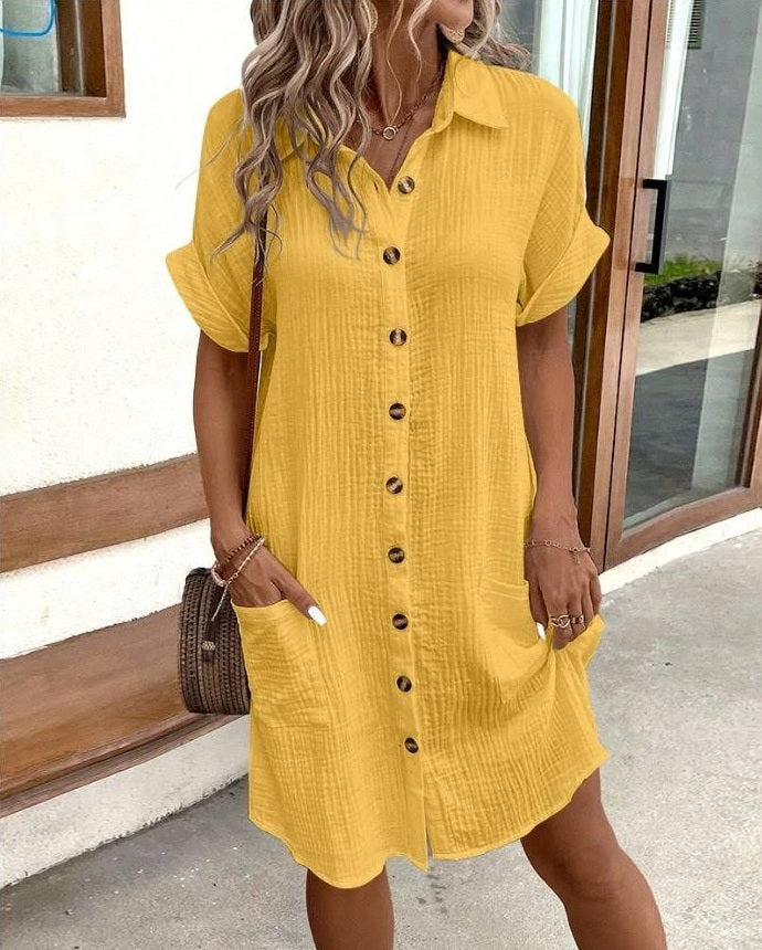 Elegante en casual Lotte zomerjurk met knoopsluiting, korte mouwen, geschikt voor elke zomerse gelegenheid.