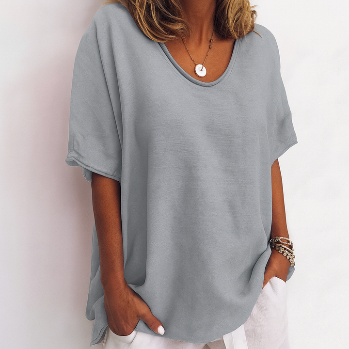 Elegant dames t-shirt met ronde hals, ideaal voor een casual of modieuze look. Veelzijdig en comfortabel.