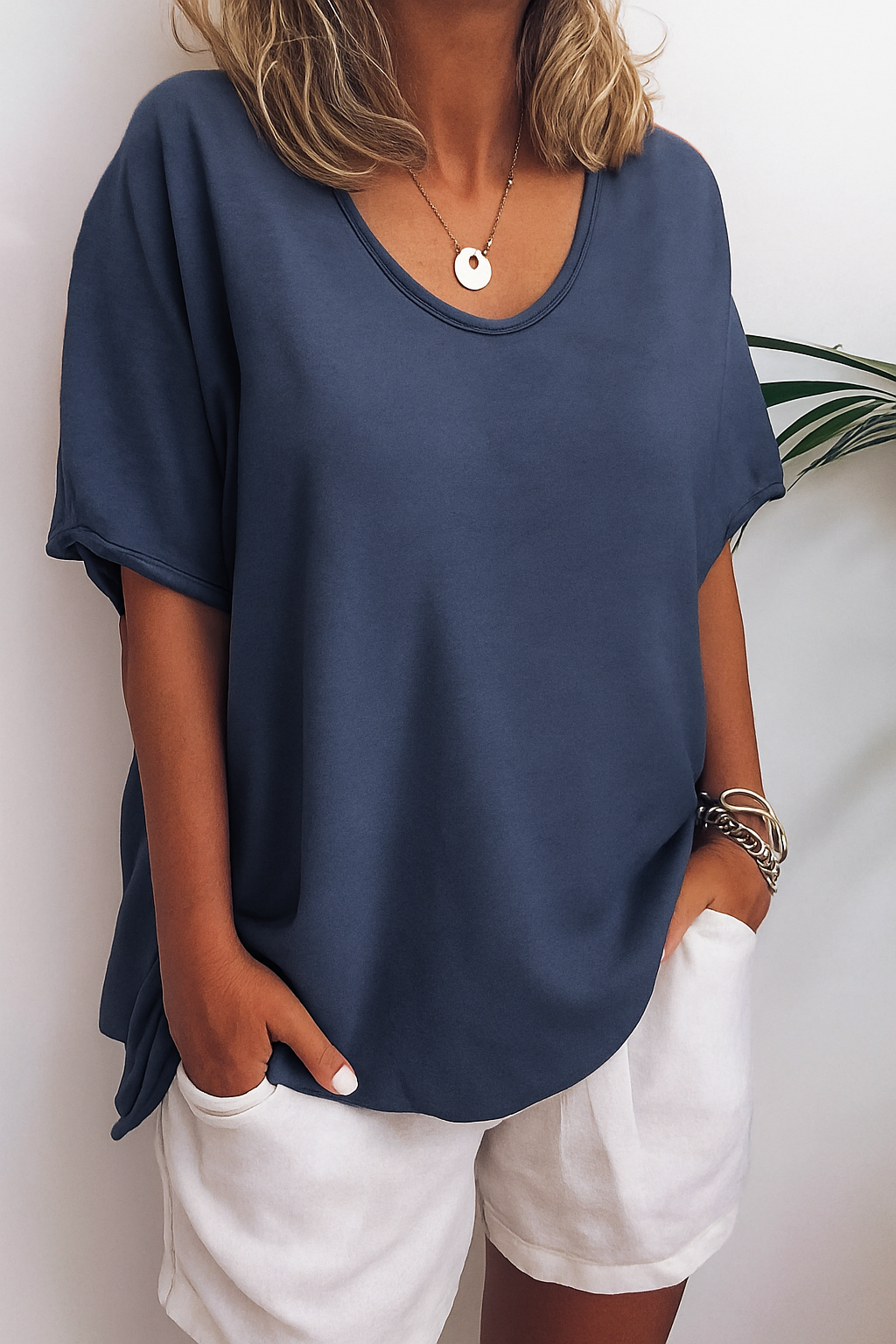 Modieus dames t-shirt met ronde hals. Comfortabel, losvallend en een essentieel item voor de zomer.
