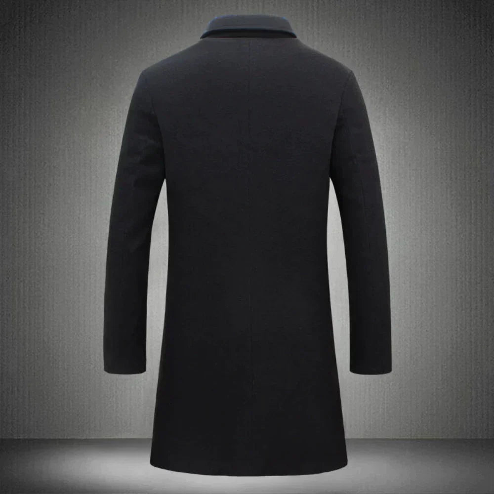 Detail van de zachte, hoogwaardige wollen stof van deze klassieke heren winterjas, ideaal voor warmte en comfort.