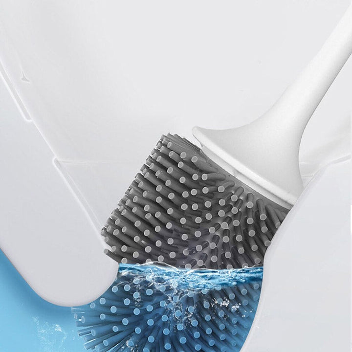 Compacte siliconen wc-borstel en houder; ideaal voor grondige badkamerschoonmaak.