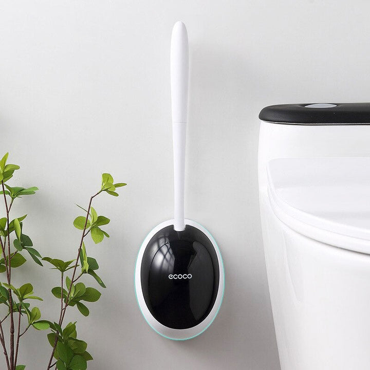 Zwarte siliconen toiletborstel, flexibel voor diepe reiniging, met discrete houder.