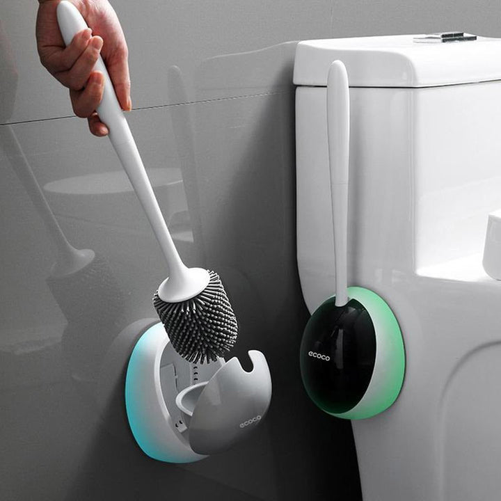 Innovatieve siliconen wc-borstel met flexibele kop en wandbevestiging voor maximale hygiëne.