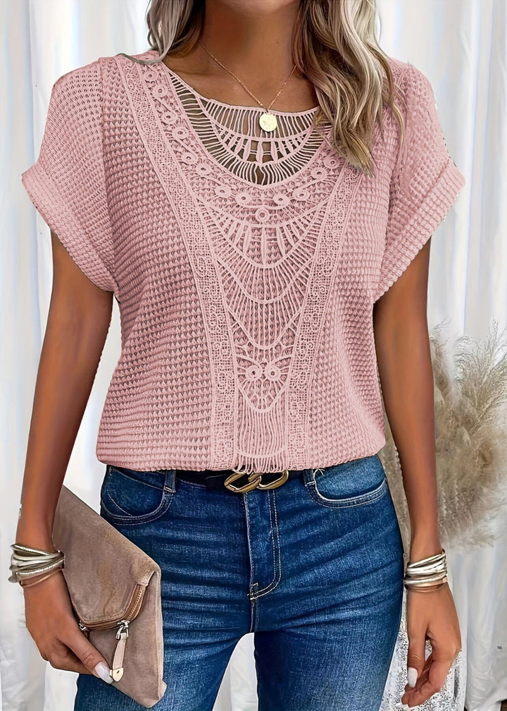 Elegante dames top met verfijnd kantdetail, perfect voor een stijlvolle lente/zomer look.