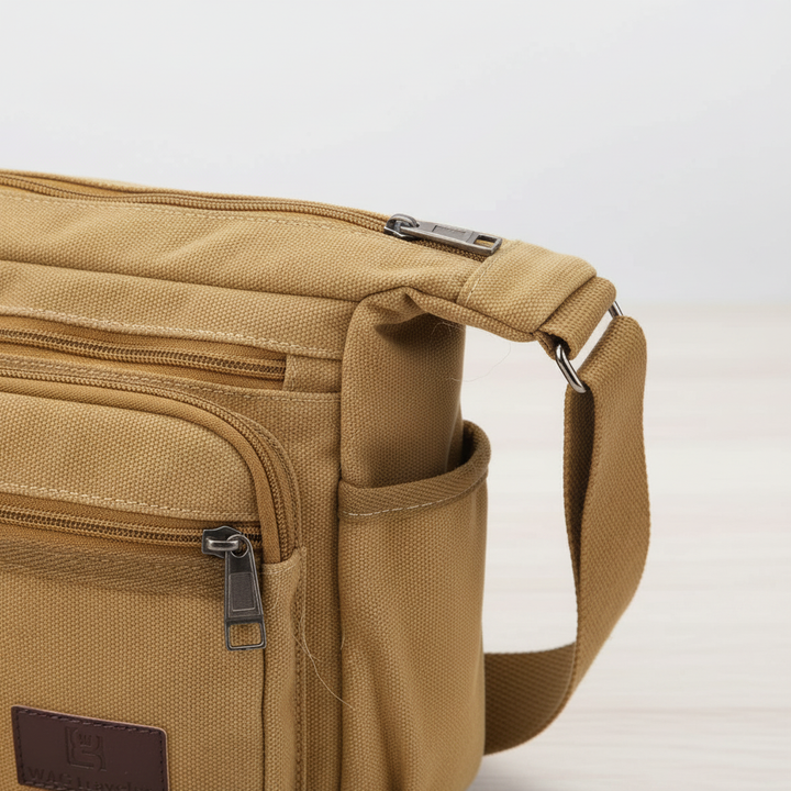 Stijlvolle canvas schoudertas voor dames en heren, met organisatie en RFID-veiligheid voor al je essentials.