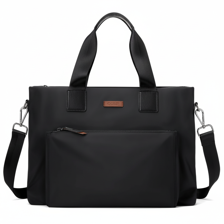 Ruime zwarte/grijze laptoptas, ontworpen voor comfort en organisatie van je werkspullen.