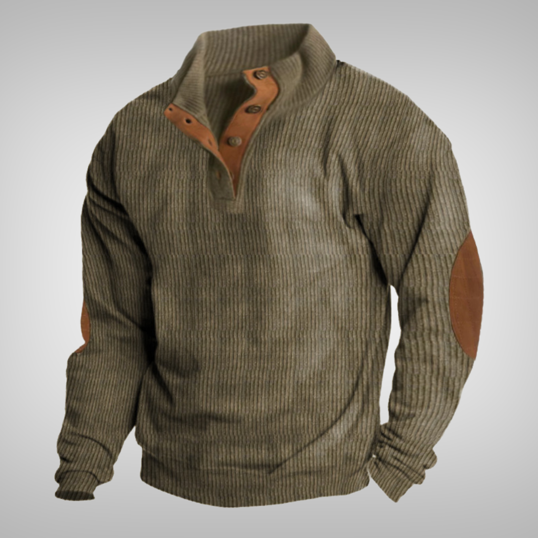 Stijlvolle heren pullover met knoopkraag en subtiele elleboogstukken. Warme trui voor koude herfst- en wintermaanden.