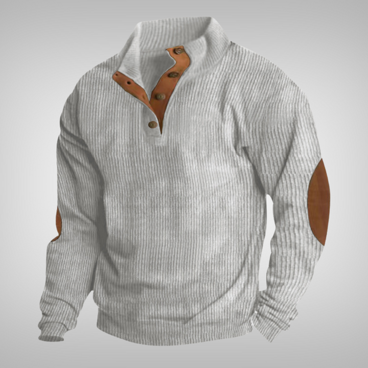Luxe heren trui met hoge kraag en knopen. Deze comfortabele pullover is ideaal voor stijlvolle, casual gelegenheden.