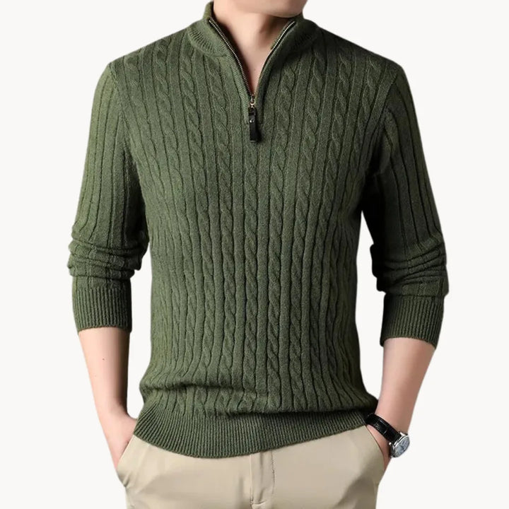 Smart-casual heren trui met verfijnd kabelpatroon en kwart rits. Geschikt voor zowel herfst als winter.
