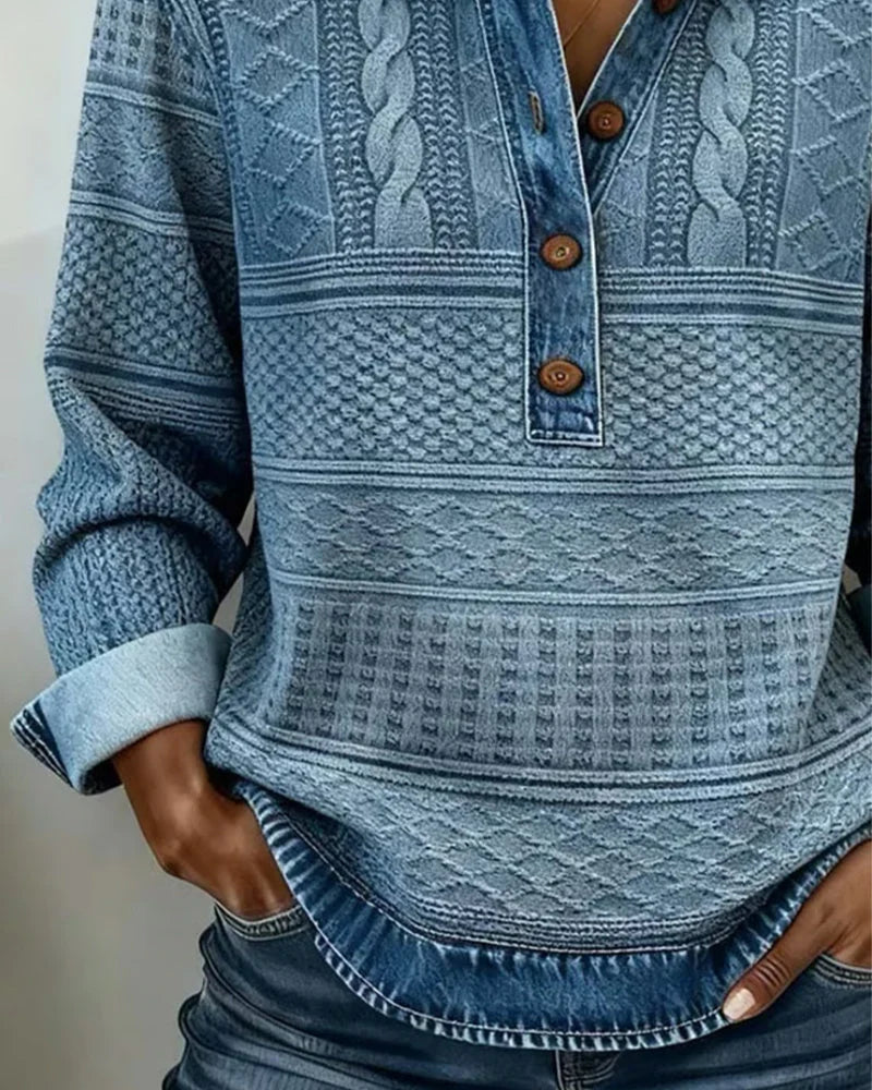 Zachte dames sweater met lange mouw en polokraag; combineert comfort met elegante structuur.