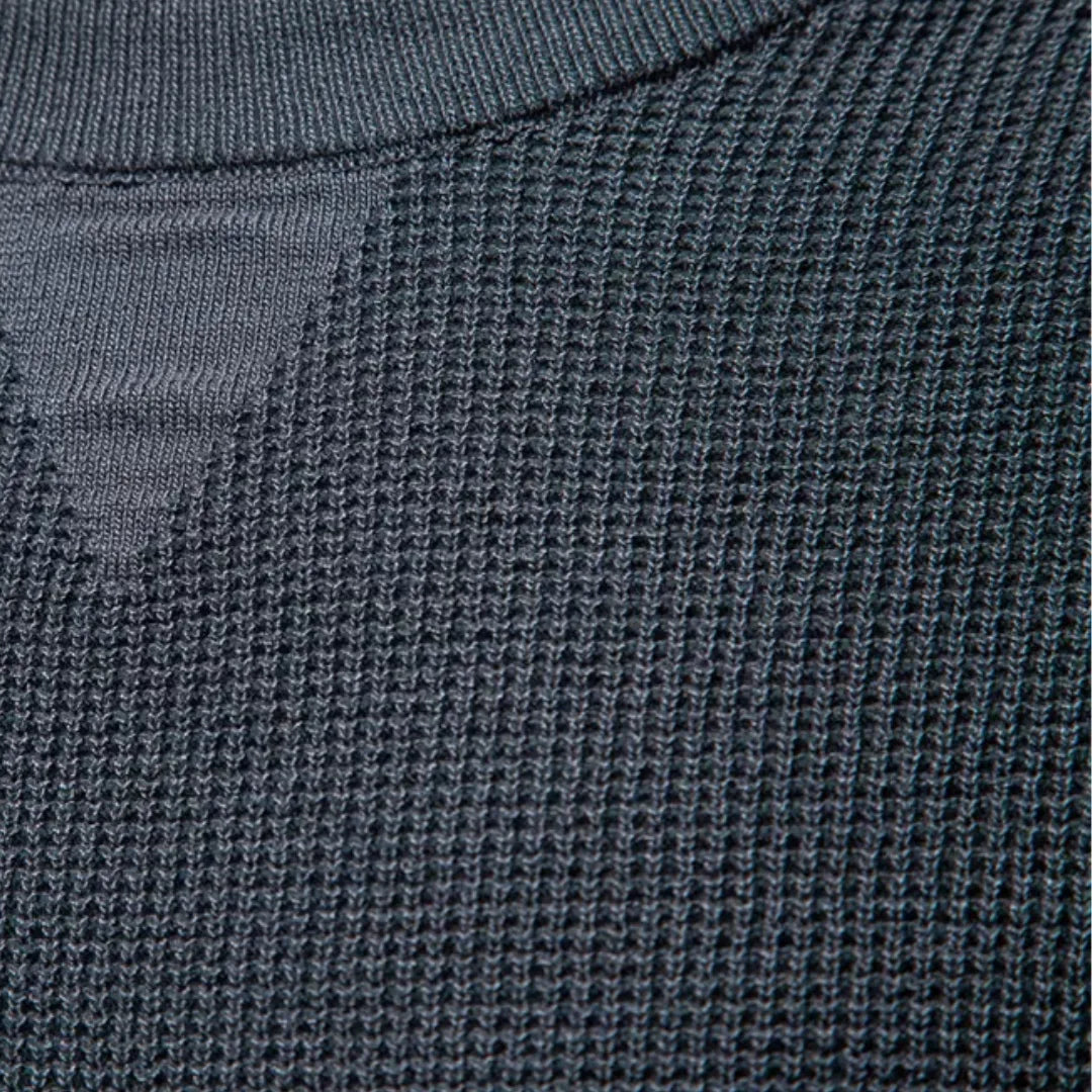Heren trui met ronde hals en raglanmouwen, biedt comfort en een tijdloze stijl voor elke gelegenheid.