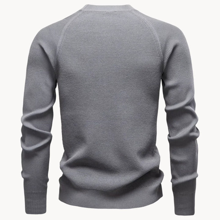 Relaxte pasvorm heren trui met ronde hals en raglanmouwen, ultiem comfort voor casual winterdagen.