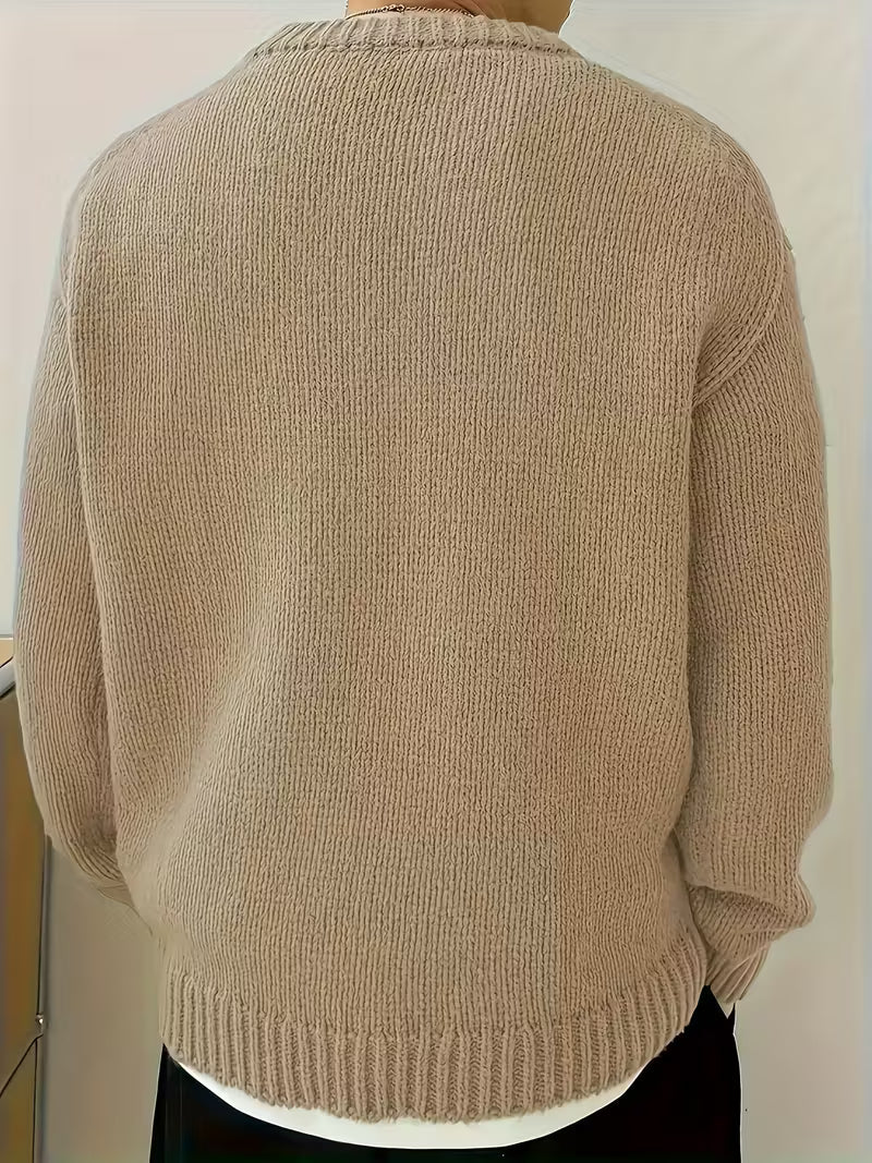 Grijze heren trui, ronde hals, ribbelstructuur. Comfortabele regular fit voor winter en herfst.