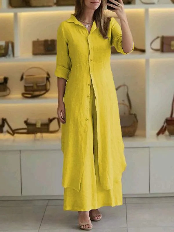 Stijlvolle dames tweedelige set met wijde broek en flowy blouse, perfect voor een elegante casual zomerlook.
