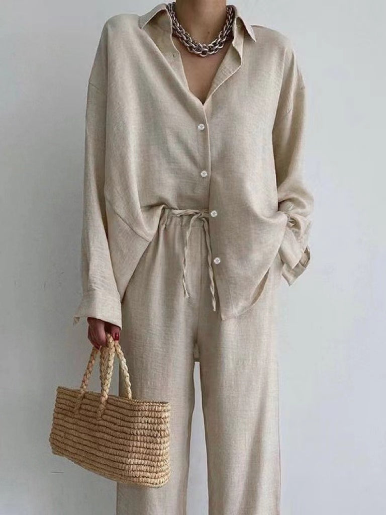 Dames tweedelige set met stijlvolle oversized blouse en comfortabele wijde broek, perfect voor lente/zomer casual chic.