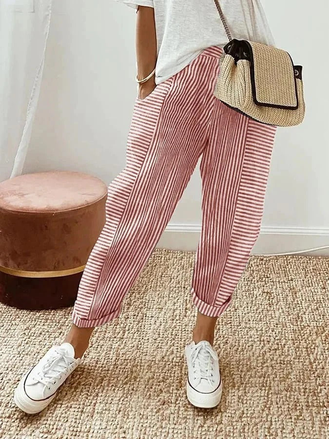 Gestreepte dames zomerbroek met hoge taille en trekkoord. Wijde pijpen zorgen voor een trendy en comfortabele loose fit.