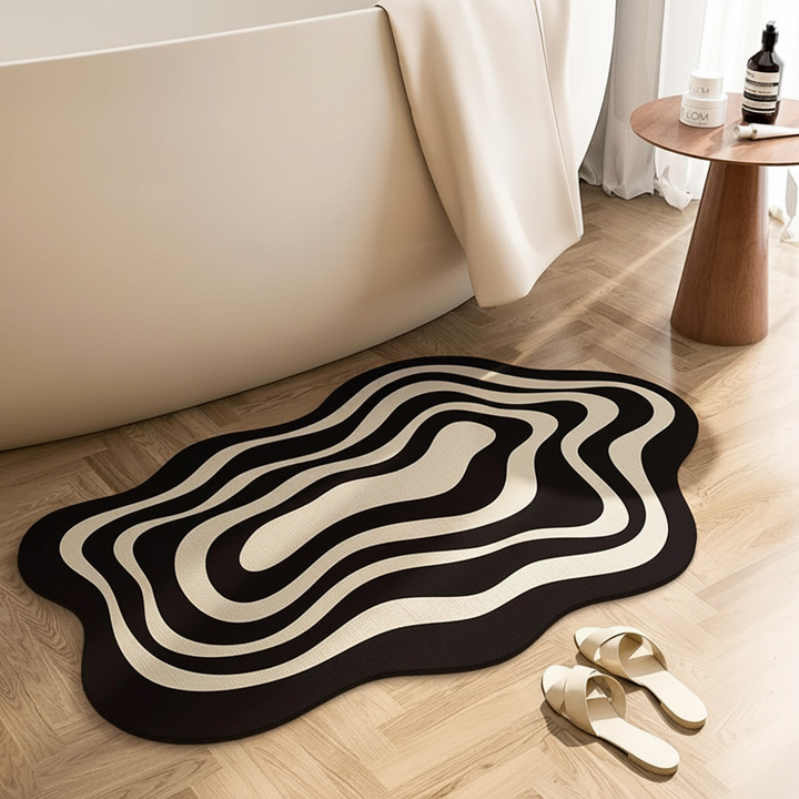 Ultra absorberende WaterfallMat badmat in de badkamer, sneldrogend en comfortabel, voor een hygiënische ervaring.