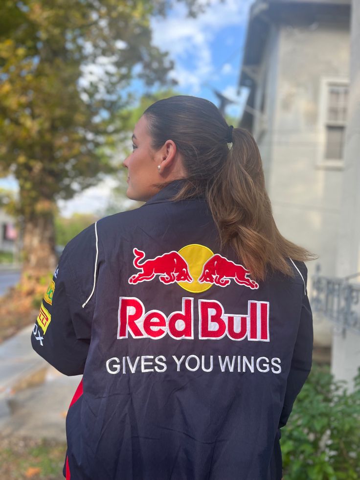Casual donkerblauwe racingjas voor heren en dames, oversized pasvorm, sportieve bovenkleding.