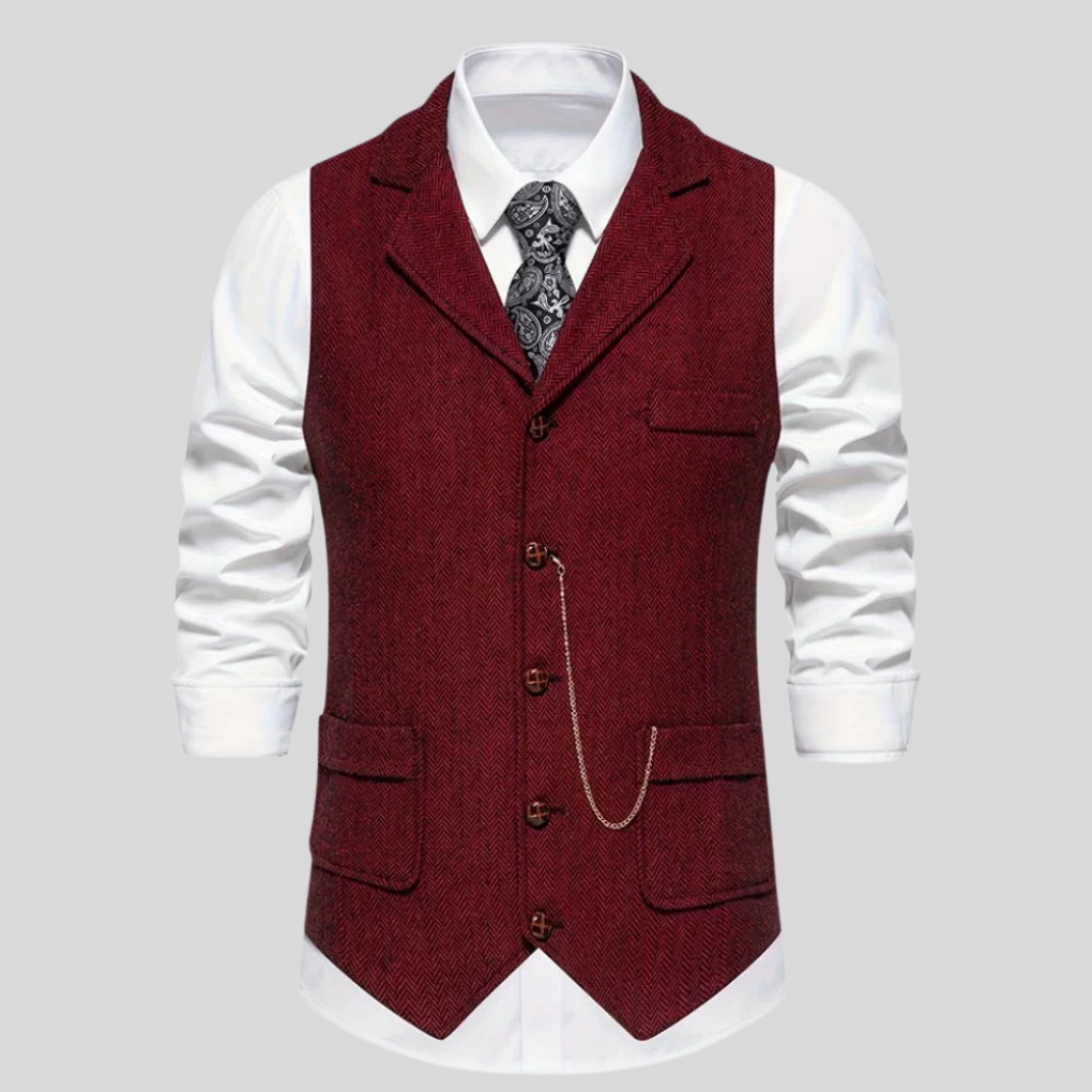 Elegant heren vest met visgraatpatroon. Dit veelzijdige wolmix vest is een tijdloze aanvulling op elke herencollectie.