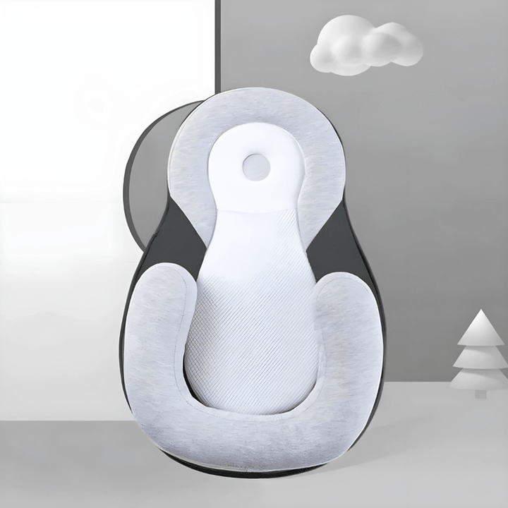 Hoogwaardig ergonomisch baby slaapkussen, biedt geborgenheid en comfort. Perfect cadeau voor babyverzorging.