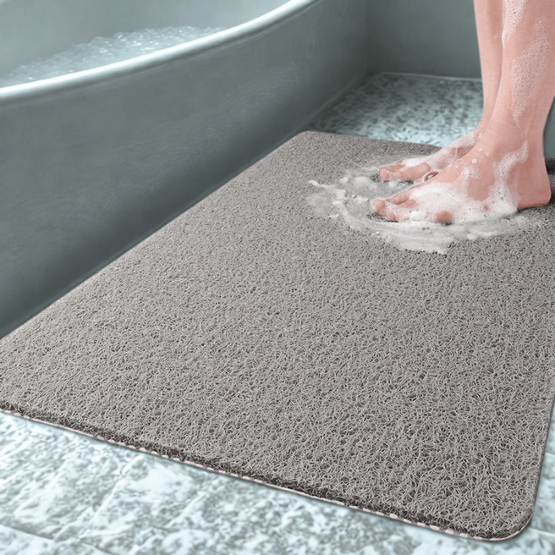 Hygiënische PVC antislip badmat met snel drogend afvoersysteem, ideaal voor een veilige douche.
