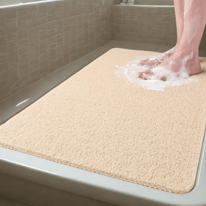 Comfortabele antislip douchemat met snel drogend afvoersysteem, essentieel voor veilige en hygiënische badkamers.