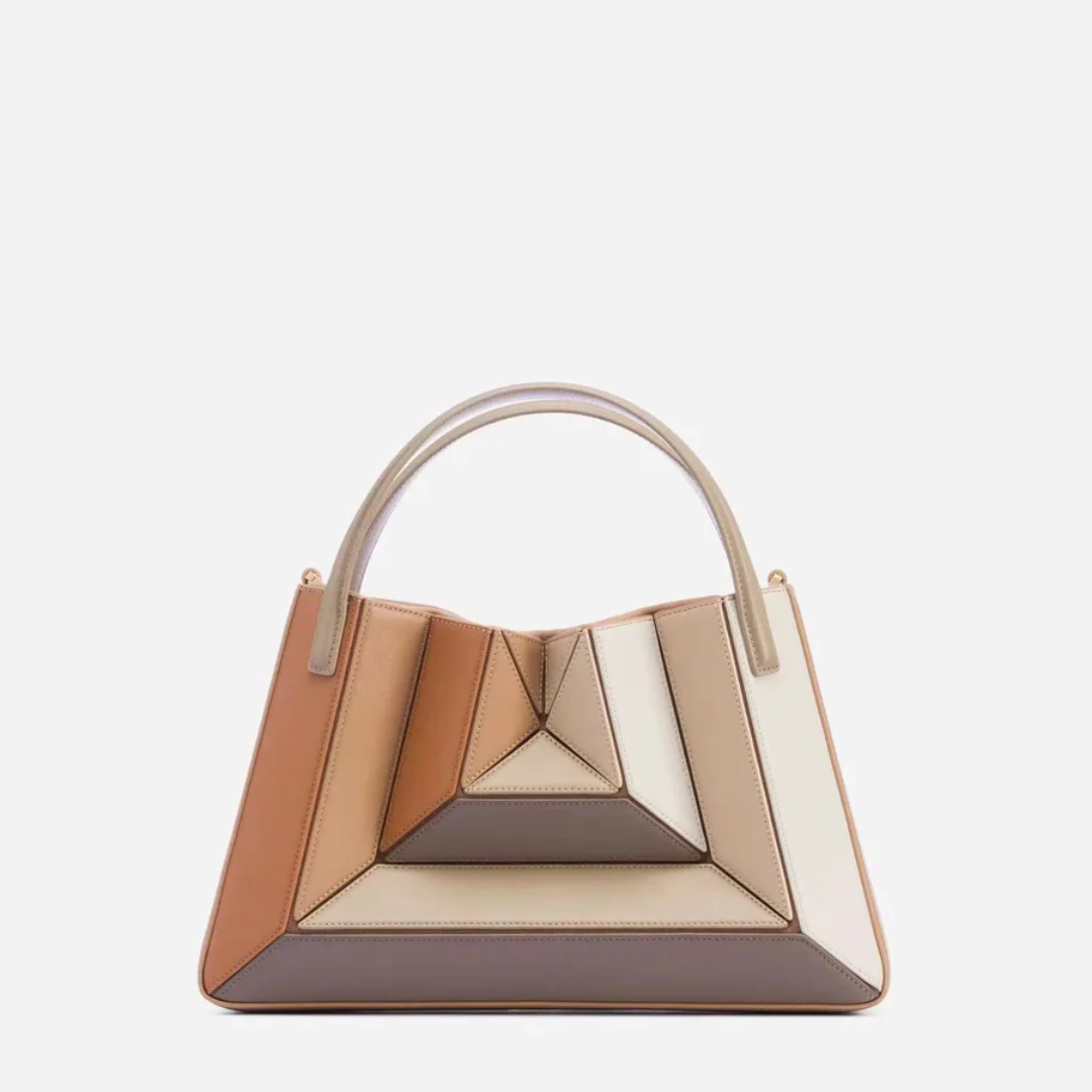 Profiel van de GeoChic dames handtas. Stijlvolle schoudertas met modern geometrisch design, trendy accessoire.